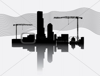 Silhouette of construction site with crane towers