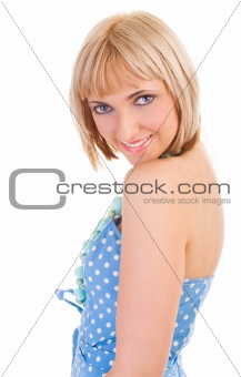 Girl in a blue polka dot dress