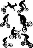 silhouette of bmx riders