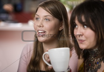 Two women in a Coffee House
