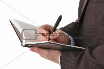 businessman hands write in notepad