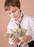 Young businessman looking on money