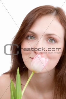 Woman portrait with bouquet of tulips