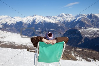 woman resting on chair
