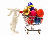 Easter rabbit with eggs in the cart