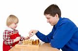 Man and girl play chess