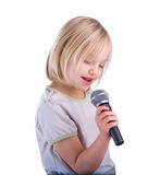 Child Singing Into Microphone