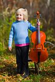 Child Standing With Cello