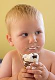 toddler boy easting ice cream