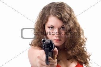 Young woman with a pistol. Isolated on white