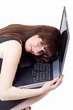 The young businesswoman lies on the laptop. Isolated