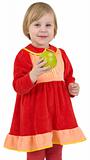Girl in the red dress with apple