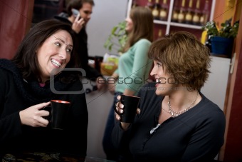 Two women in a coffee house