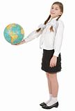 Girl and terrestrial globe on white