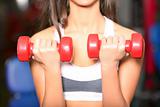 The girl with dumbbells 