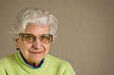 Senior lady portrait,  glasses, with copy space.