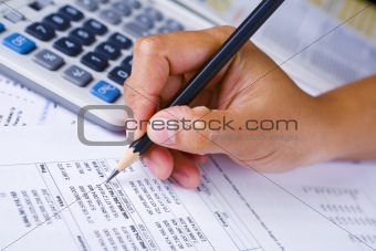 Hand checking financial report