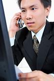 Young Asian businessman on the phone