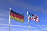 American and German flag in the wind