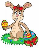 Easter rabbit with eggs basket