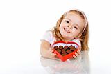 Happy little girl with chocolate