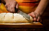 Adding cut to unbaked bread dough