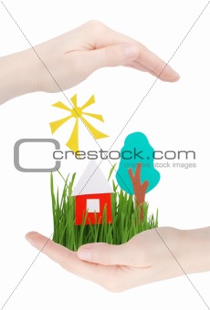 The house, tree, the sun and grass in hands