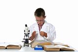 child scientist looking at microscope slide