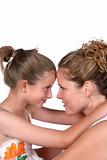 mother and daughter with foreheads touching