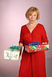 attractive older woman holding gifts