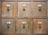 Detailed Antique Wood Filing Cabinet Drawers Image