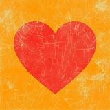 Weathered picture of a red heart with orange backdrop