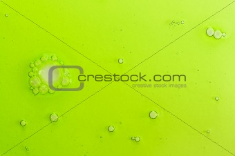 Abstract background with green liquid