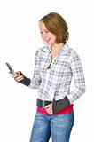 Teenage girl text messaging on a cell phone
