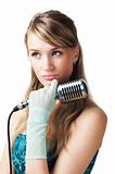 Pretty young girl holding retro microphone