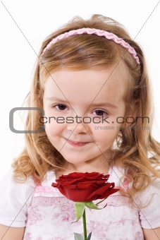 Happy little girl with rose
