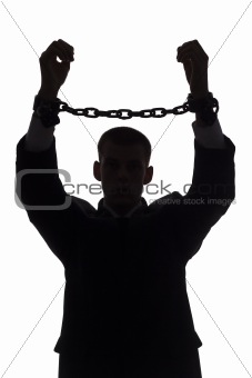 silhouette of man with chains