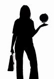 silhouette of woman with suitcase and globe