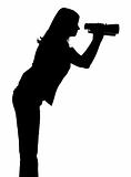 silhouette of woman with binoculars