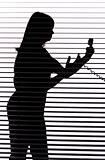 silhouette of woman on the phone (blind)