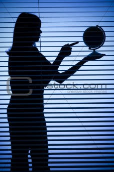 silhouette of woman with globe (blind)
