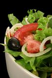 Salad bowl with fresh salad and tomato