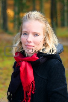 blonde in an autumn wood