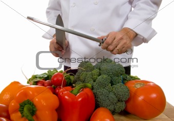 Chef - man sharpening knife