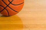 Basketball on gym floor