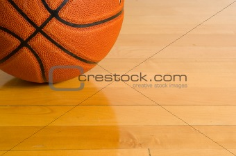 Basketball on gym floor
