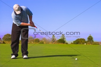 Golfer putting