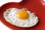 traditional fried egg on  heart shape plate