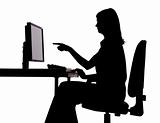 silhouette of woman working computer - pointing screen
