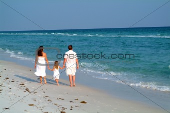 Family Walking on the Beach
